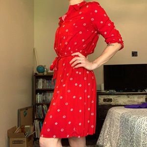 Red dress with small paisley like print. Size large. Never worn.